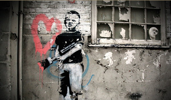 Banksy's "Heart Boy" Graffiti Goes From London to Amsterdam
