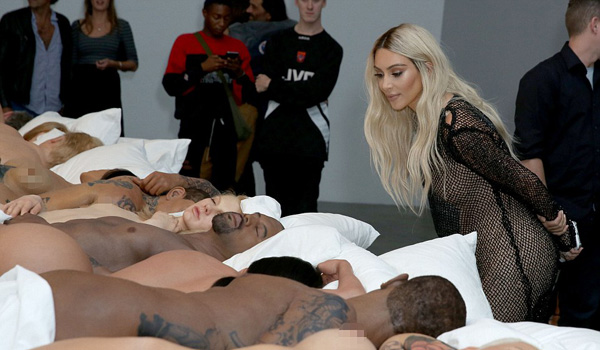 Kim Kardashian Admires Her Wax Figure at Kanye West's Art Exhibition