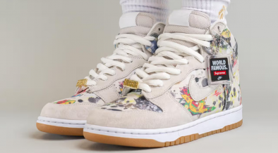 Side view of the high-top Supreme x Nike SB Dunk Rammellzee