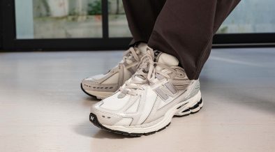 An on-feet look of the New Balance 1906R "White Raincloud".